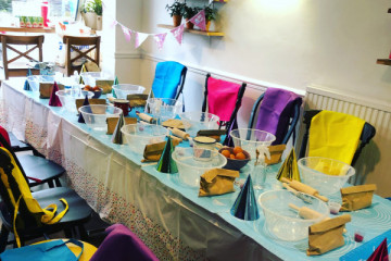 Table is set for the birthday party.