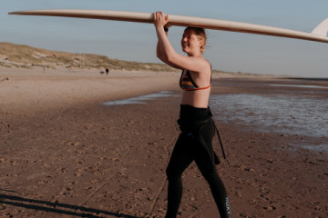 Surfboard + wetsuit rental