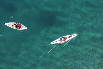 Kayak on river and sea