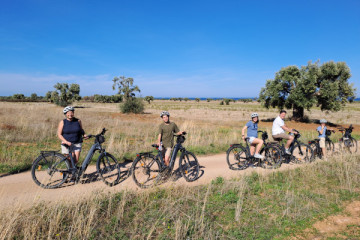 E-bike tour in the Ostuni countryside. Visit to an oil mill