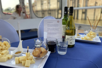 “Gourmet harbor cruise with cheese and wine”