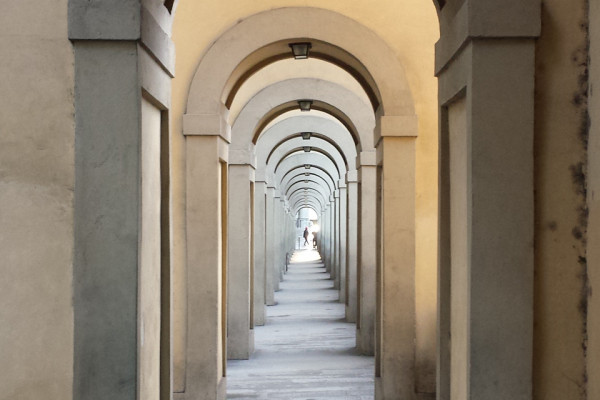 Under tha Vasarian Corridor towards the Uffizi Gallery in Florence