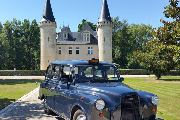 Visit the main castle with a special English style car and a glass of red wine