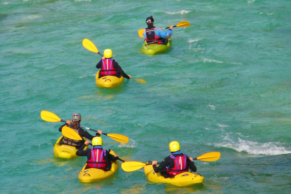 Kayaking in small groups.