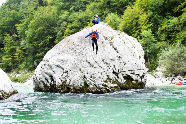 ACTION RAFTING: Option to jump from Manhattan rock.