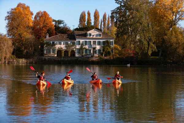 Kayaking among the villas
