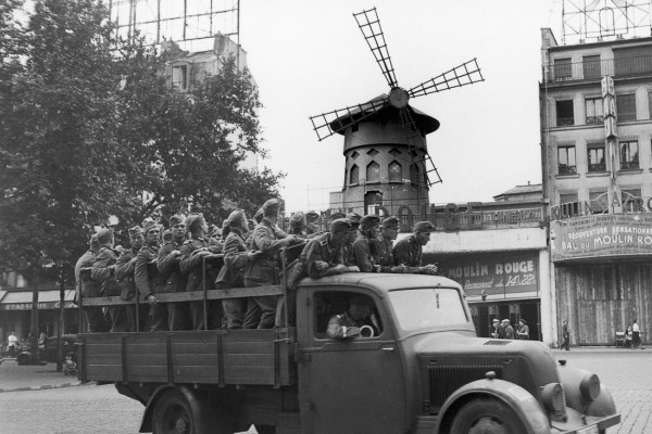 German troops in front of the Moulin Rouge