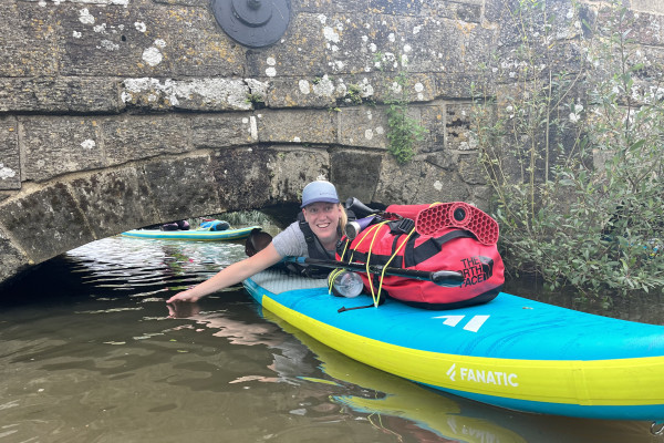 Paddling under a bridge on the River Arun West Sussex