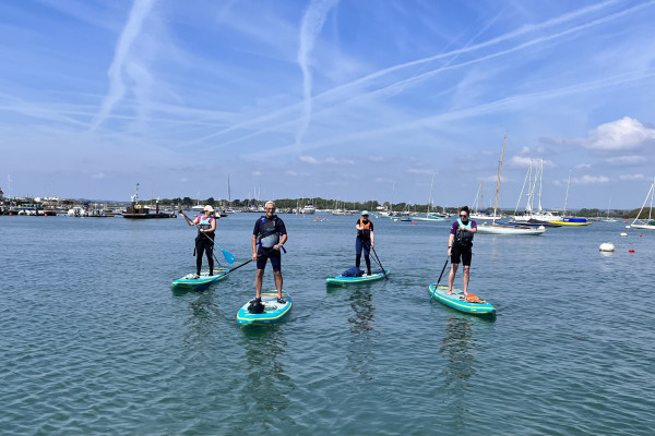 Stand-up paddleboarding in Chichester harbour west Sussex
