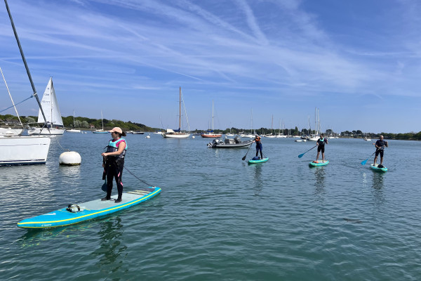 Stand-up paddleboarding in Chichester harbour west Sussex