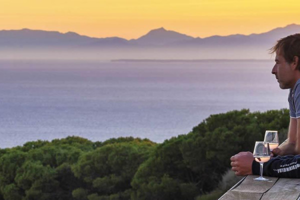 Reserved place on a terrace overlooking the sea and the vineyard