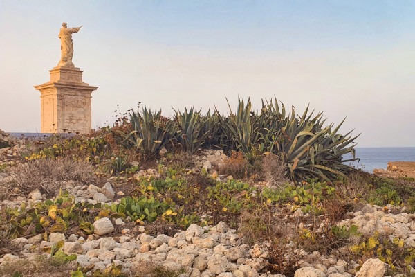 The statue of St Paul's towering at the top of the Island.