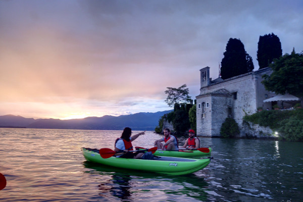 Canoetour with sunset in Garda
