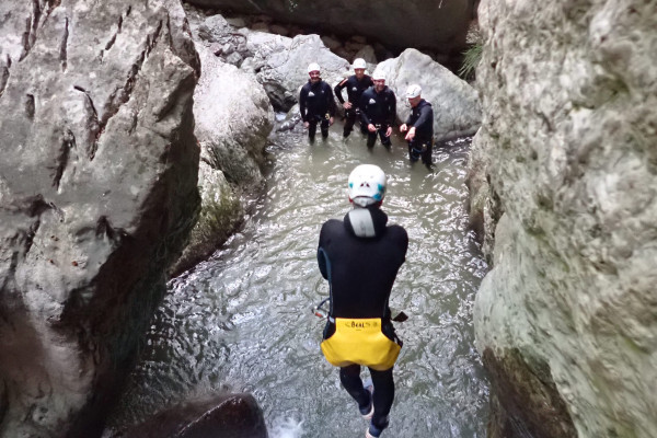dive into the crystal clear water Vajo dell'Orsa