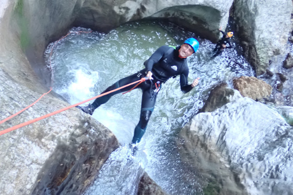 repelling down a waterfall