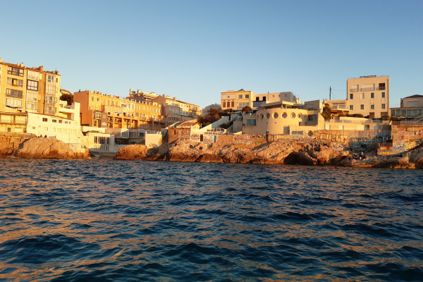 discover Marseille by the sea at sunset