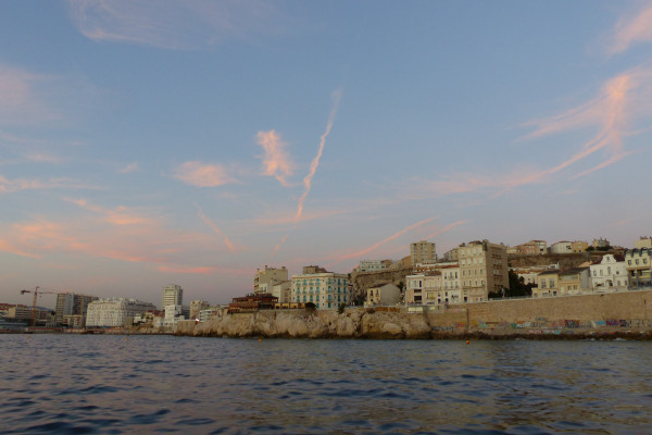 Marseille at sea at sunset