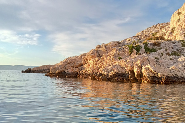 see the sunset in the calanques of Marseille