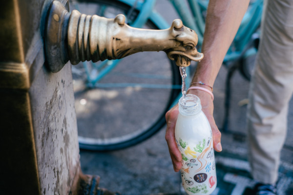 Filling our beautifully designed water bottle at the Green Dragon, aka Le Vedovelle