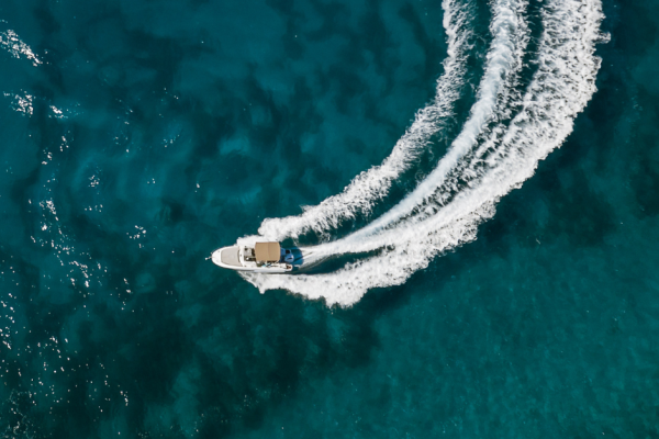 Trainees learning essential navigation techniques onboard powerful speedboats, a part of their immersive RYA Powerboat Level 2 course experience.
