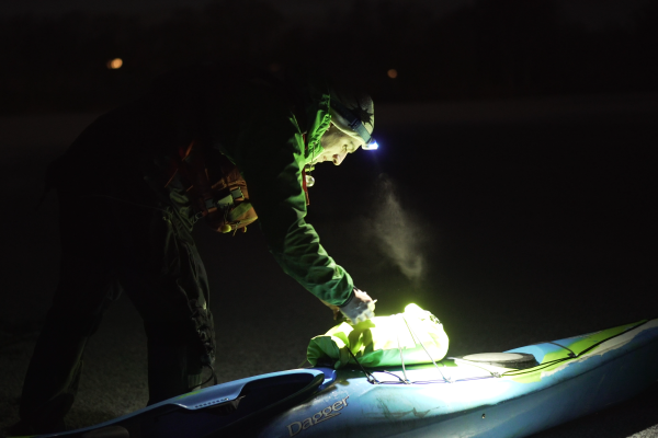 Winter time night kayaking at Clunie Loch