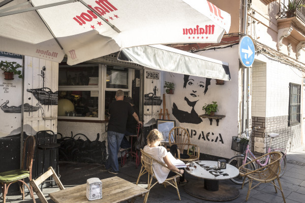 Traditional Valencian café terrace in El Cabanyal, perfect for enjoying local specialties by the coast.