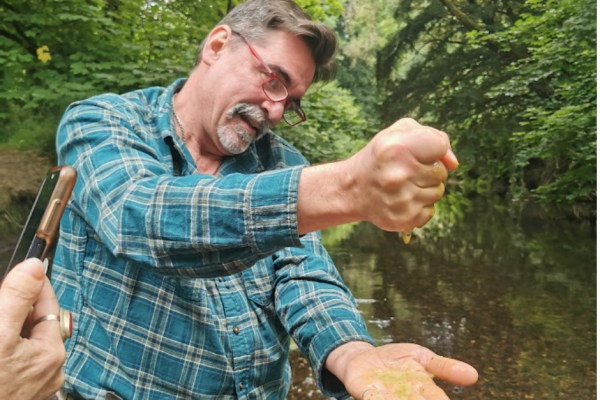 Making leaf soap in the river