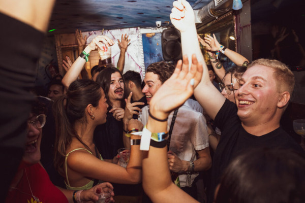 Dancing the night away on Pink Street during our Lisbon pub crawl adventure