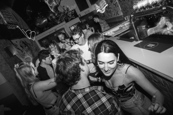 Experience Lisbon after dark: pub crawl, live music & nightclub VIP access