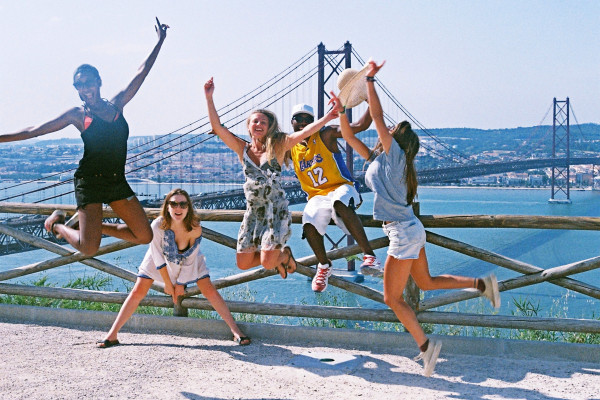 End the day with panoramic views over Lisbon from the Christ-King statue square.