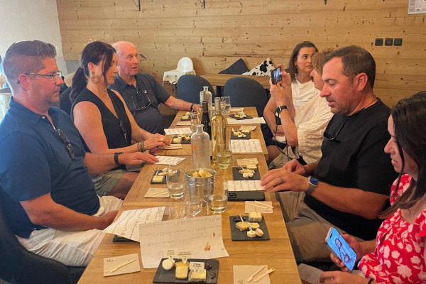 Pouring cheese and wine in Provence 