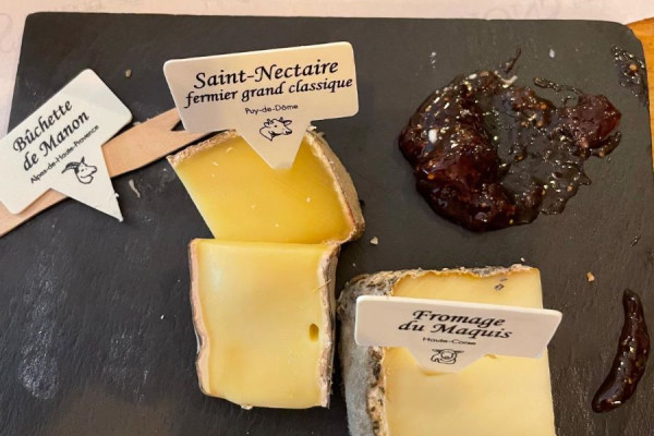 Pouring cheese and wine in Provence 