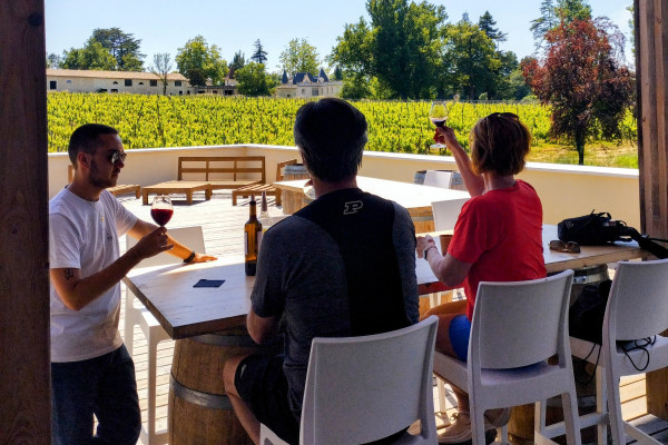 Gourmet moment at a château during the wine tasting stop.