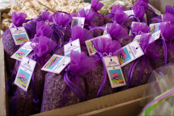 A stall selling products made with Provence lavender, with lavender sachets in the foreground.