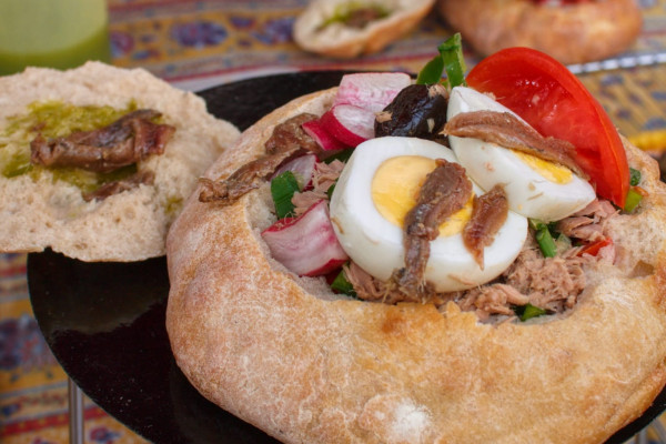 A pan bagnat, a Provençal sandwich, made exclusively with local and seasonal products.