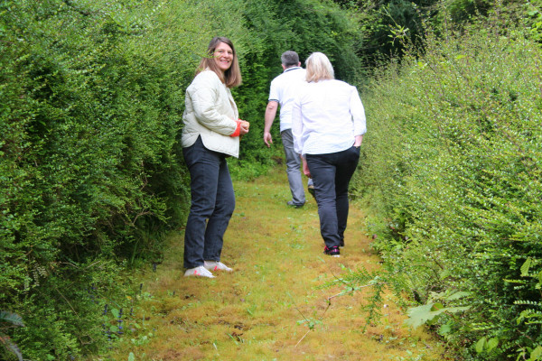 Follow your hosts through their garden!